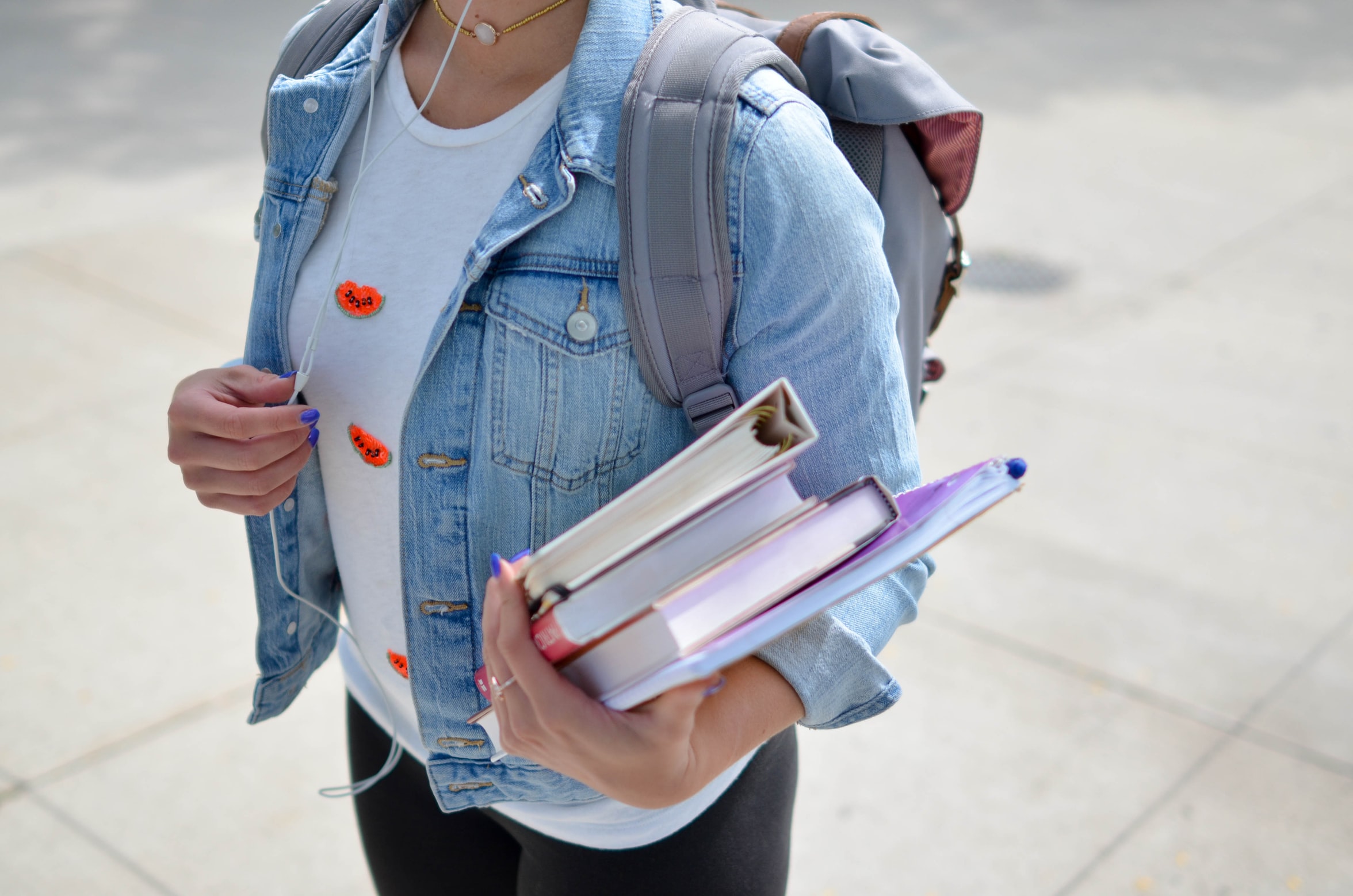 College student holding books